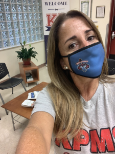 Principal Coto-Gonzalez wearing a face mask
